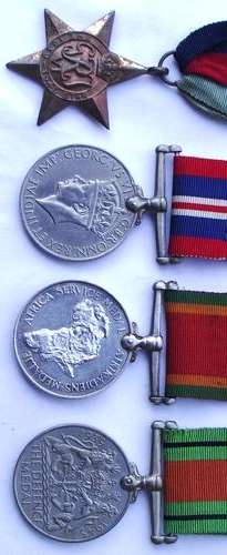 WW2 MEDALS: The STAR of AFRICA; WAR MEDAL 1939-1945; AFRICA SERVICE MEDAL & THE DEFENCE MEDAL