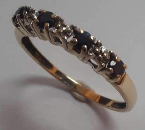 9CT YELLOW GOLD SAPPHIRE AND DIAMOND ETERNITY RING