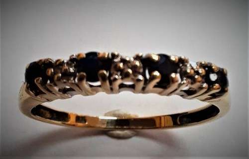 9CT YELLOW GOLD SAPPHIRE AND DIAMOND ETERNITY RING