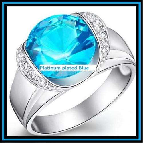 BEYOND STUNNING!!!! PLATINUM PLATED RING WITH A BLUE AUSTRIAN CRYSTAL (size 8)