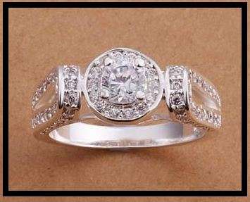 BEYOND STUNNING!!!! 18K WHITE GOLD PLATED RING WITH AUSTRIAN CRYSTALS