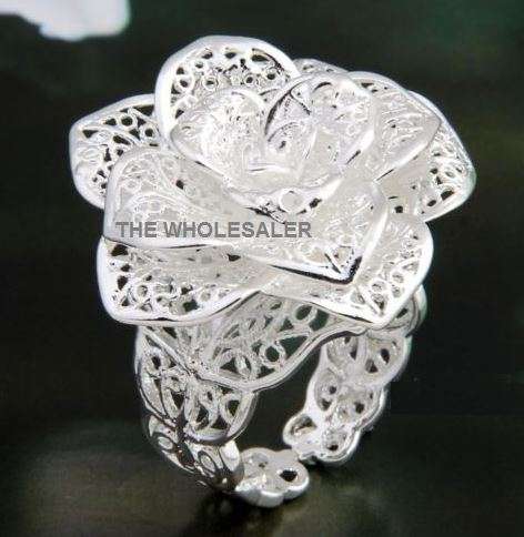 ***925 STAMPED SILVER PLATED ADJUSTABLE RING, WILL ADJUST TO ANY RING SIZE***350.00 VALUE***