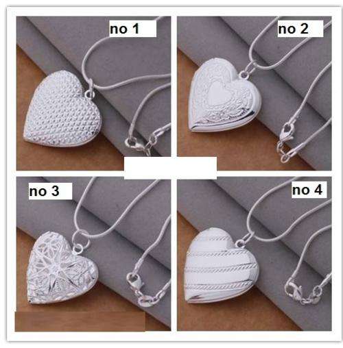 925 STAMPED SILVER HEART LOCKET***350.00 VALUE***