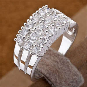 BEYOND STUNNING!!!! THREE ROW SILVER PLATED RING WITH AUSTRIAN CRYSTALS