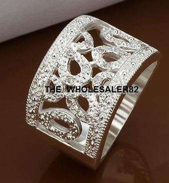 POSTAGE ONLY R35.00***925 STERLING SILVER FILLED RING WITH FREE MATCHING EARRINGS