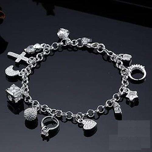 POSTAGE ONLY R35.00***925 STERLING SILVER 13 PIECE CHARM BRACELET***