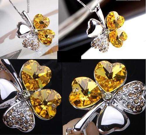 POSTAGE ONLY R55.00***SILVER FILLED 4 LEAF CLOVER NECKLACE***