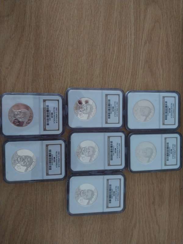 7 x Silver R1 2007 Nelson Mandela MS65 graded coins.