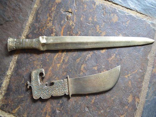 Unusual pair - Brass ornamental dagger and sword. January breather - only pay by 27/01/14