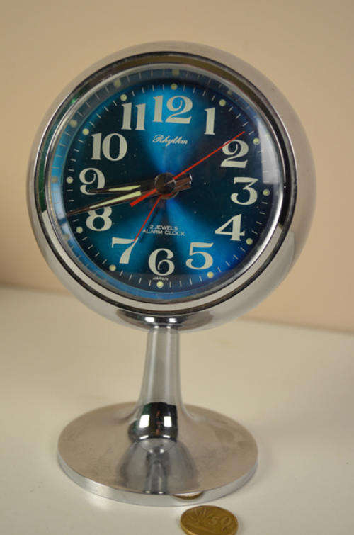 Japanese 1970's Rhythm Pedestal  2 jewels alarm clock with silver coloured casing and pedestal