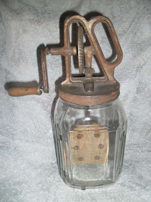 "Dandy" glass and cast metal butter churn