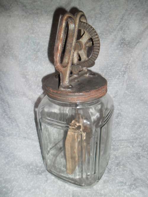 "Dandy" glass and cast metal butter churn