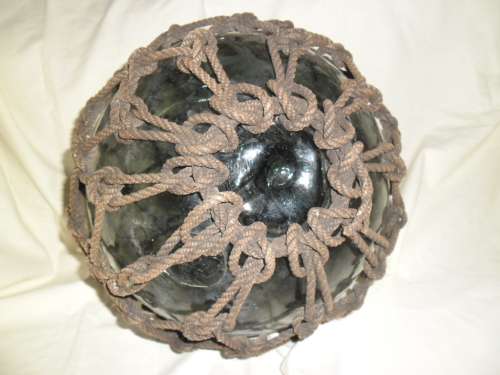 Large  1930's  Japanese Glass Fishing Float with original rope and makers mark.