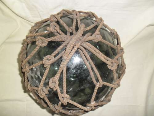 Large  1930's  Japanese Glass Fishing Float with original rope and makers mark.