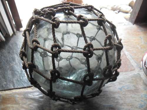 Large  1930's  Japanese Glass Fishing Float with original rope and makers mark.