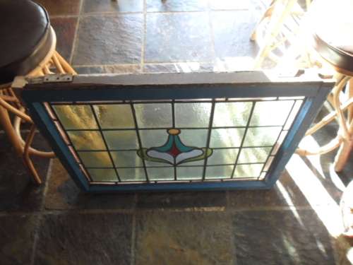 Vintage stained glass window in frame