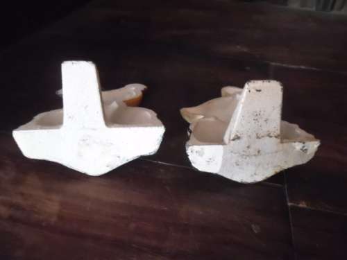 Pair of petite cast metal doorstops. Duck and chicken