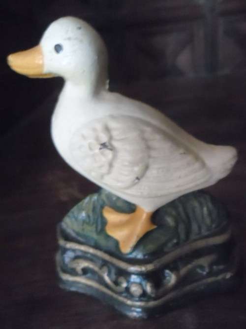 Pair of petite cast metal doorstops. Duck and chicken