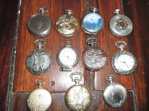 11 vintage-style battery operated  pocket watches