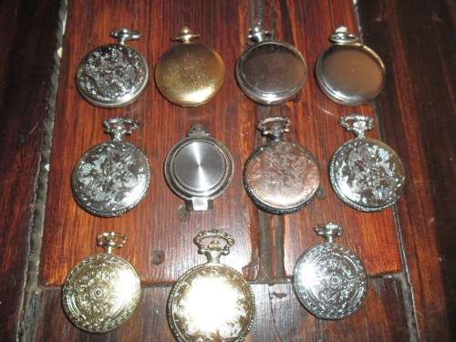 11 vintage-style battery operated  pocket watches