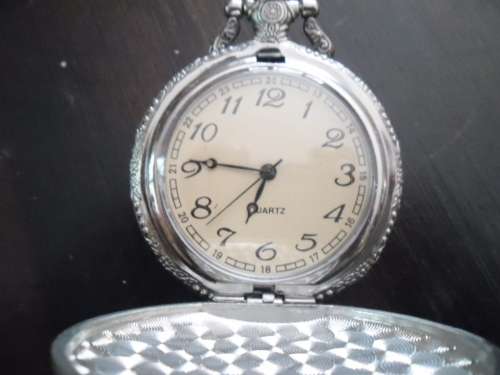 11 vintage-style battery operated  pocket watches