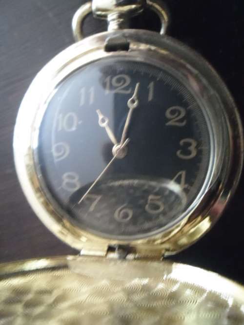 11 vintage-style battery operated  pocket watches