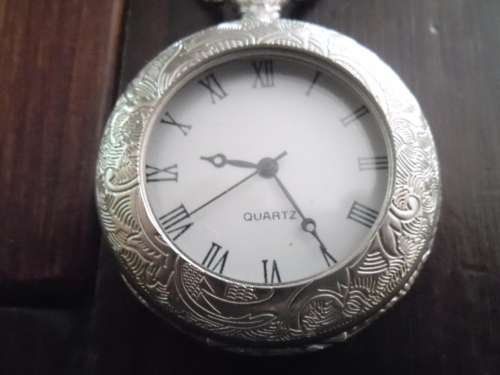 11 vintage-style battery operated  pocket watches