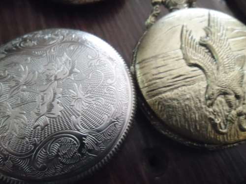11 vintage-style battery operated  pocket watches