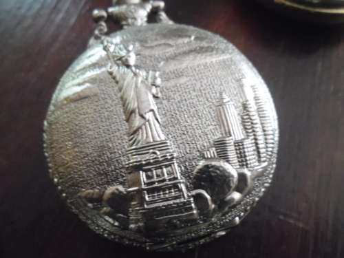11 vintage-style battery operated  pocket watches
