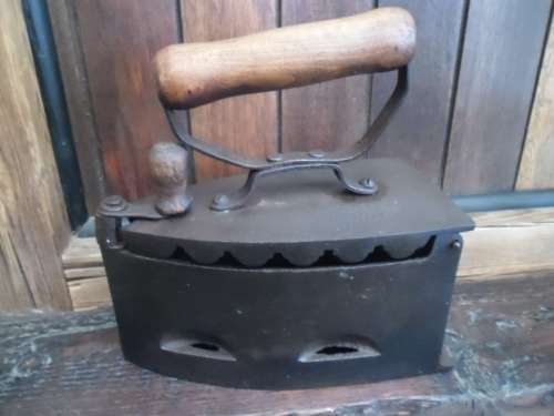 Large antique coal type sad iron.