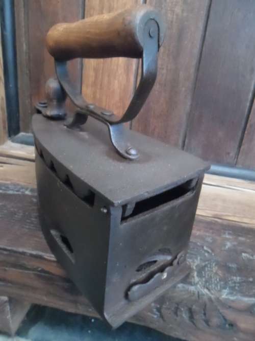 Large antique coal type sad iron.
