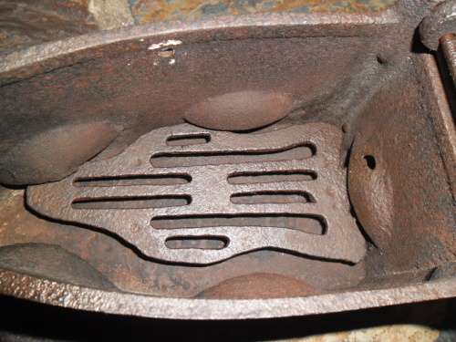 Large antique coal type sad iron.