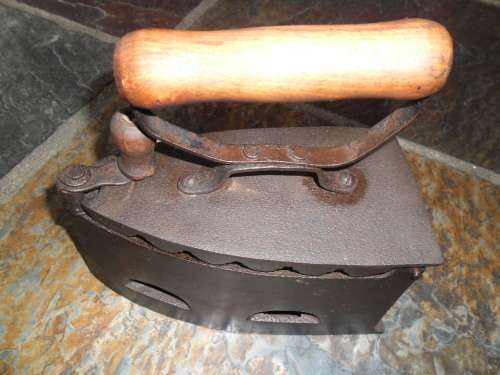 Large antique coal type sad iron.