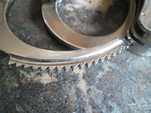 Pair of Alcyon Handcuffs with key. Made in Spain