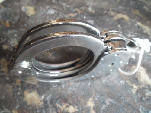 Pair of Alcyon Handcuffs with key. Made in Spain