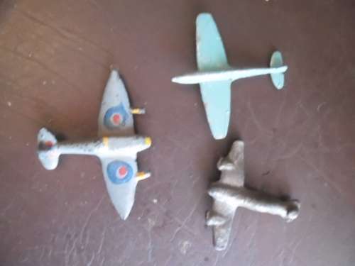 3 vintage cast metal toy airplanes