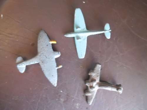3 vintage cast metal toy airplanes