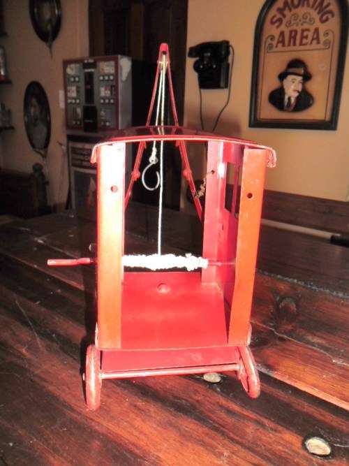 Triang Toys 1930's toy crane with metal wheels.