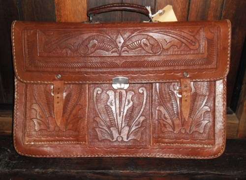 Vintage tooled leather satchel.