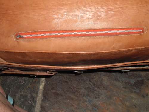 Vintage tooled leather satchel.