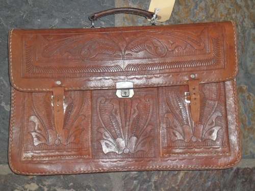 Vintage tooled leather satchel.