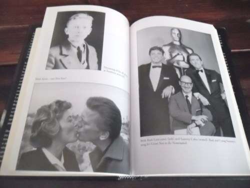"Let's Face It  90 Years of Living, Loving, and Learning"  by Kirk Douglas.  Signed copy !