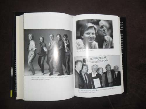"Let's Face It  90 Years of Living, Loving, and Learning"  by Kirk Douglas.  Signed copy !