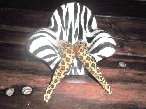 Probably one of a kind!! - Funky ceramic legs on couch. Original by Michelle