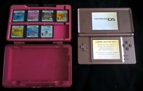 Nintendo DSlite console with games.