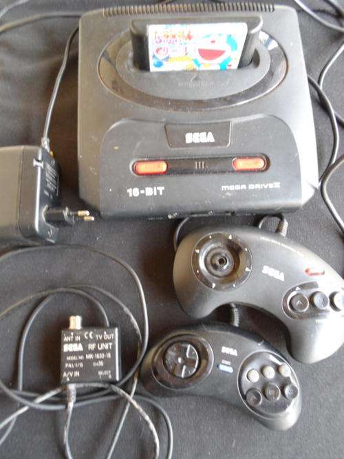 SEGA game console + 2 games