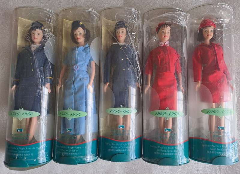 Set of 9/9 Hermes Design Cathay Pacific`s Flight Attendant Uniform doll set 1946-1999.