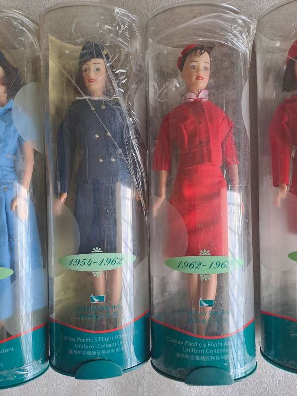 Set of 9/9 Hermes Design Cathay Pacific`s Flight Attendant Uniform doll set 1946-1999.