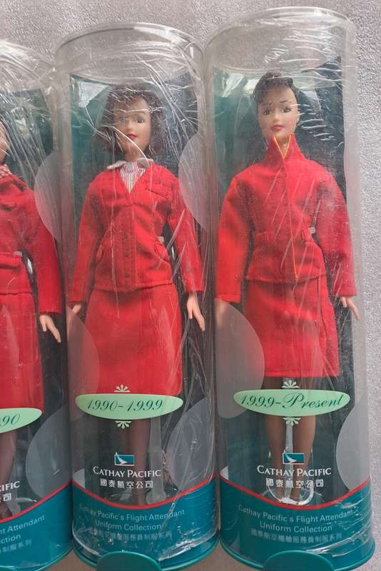Set of 9/9 Hermes Design Cathay Pacific`s Flight Attendant Uniform doll set 1946-1999.