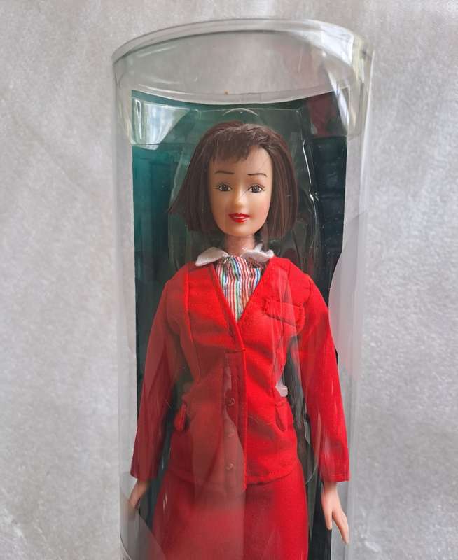 Set of 9/9 Hermes Design Cathay Pacific`s Flight Attendant Uniform doll set 1946-1999.